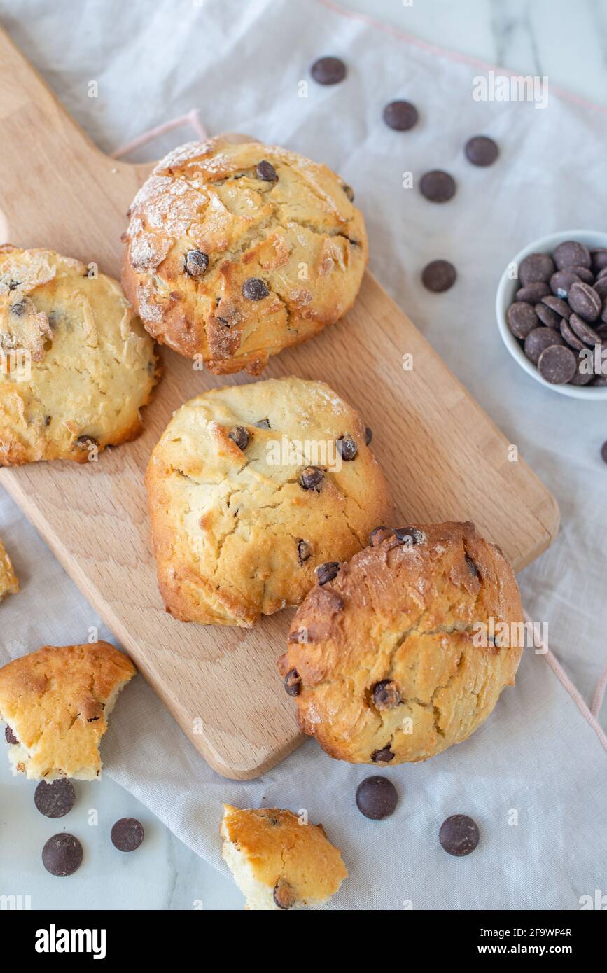 sweet home made chocolate chip scones on a table Stock Photo