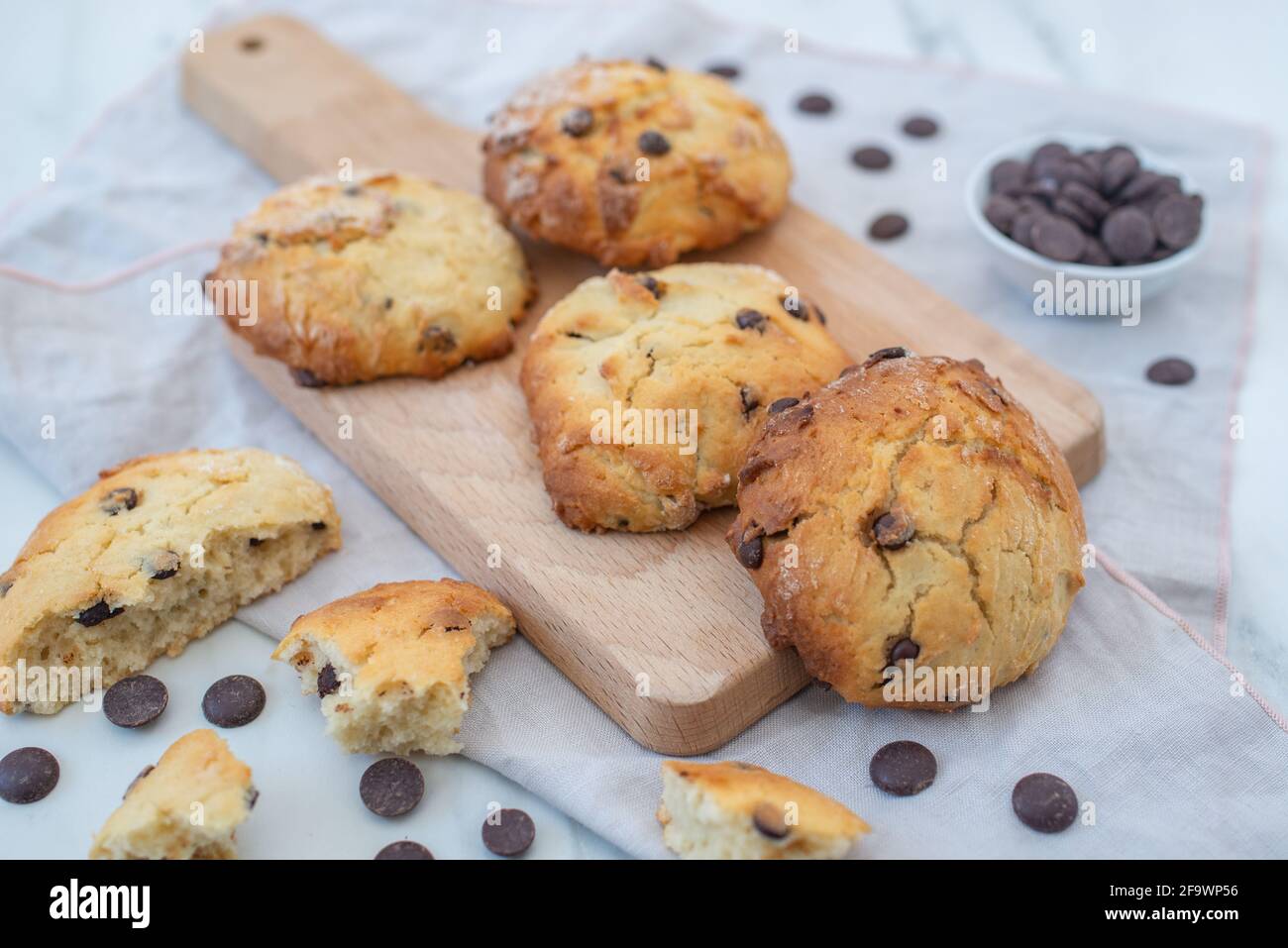 sweet home made chocolate chip scones on a table Stock Photo