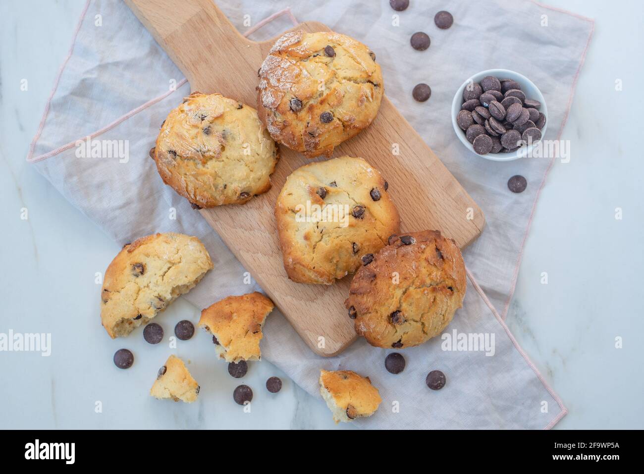 sweet home made chocolate chip scones on a table Stock Photo