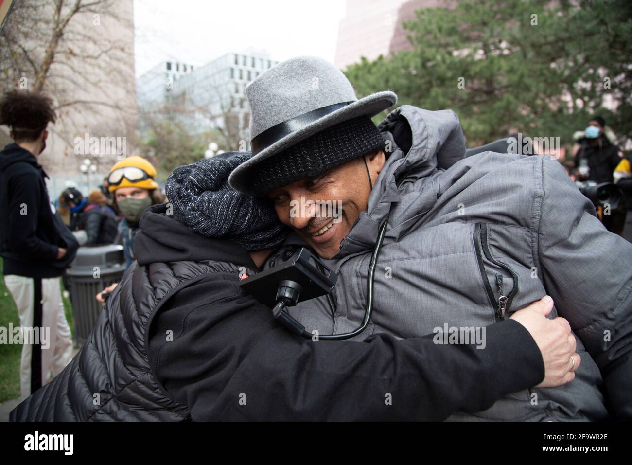 Minneapolis, Minnesota, USA. 20th Apr, 2021. April 20, 2021-Minneapolis, Minnesota, USA: Michael Jones embraces another reveler to celebrate the guilty verdict in Derek Chauvin's case. Minneapolis residents celebrated Derek Chauvin's guilty verdict for the murder of George Floyd on May 25, 2020. Credit: Henry Pan/ZUMA Wire/Alamy Live News Stock Photo