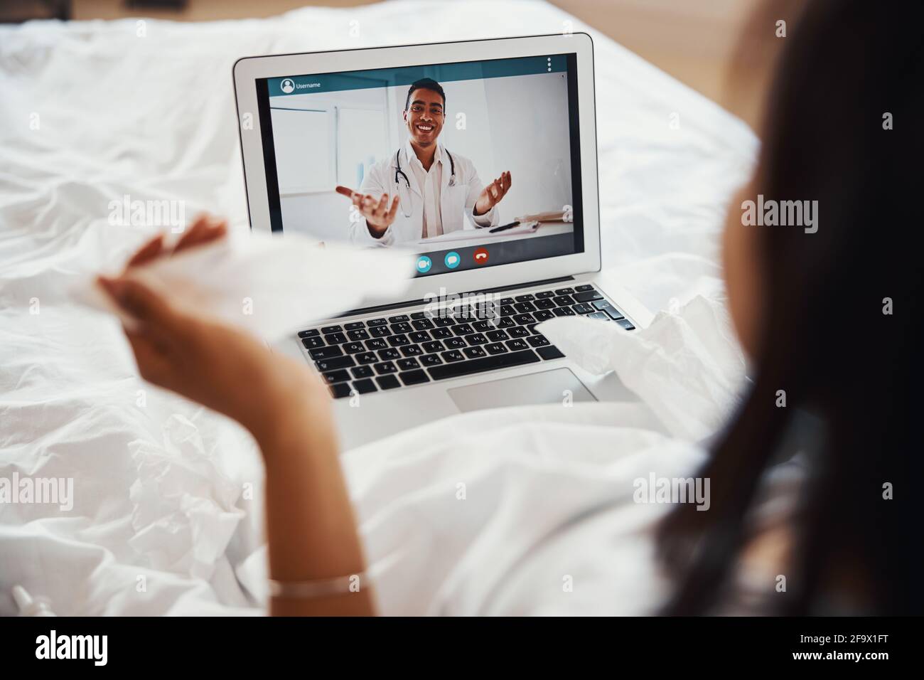Female multiracial doctor patient talking hi-res stock photography and ...