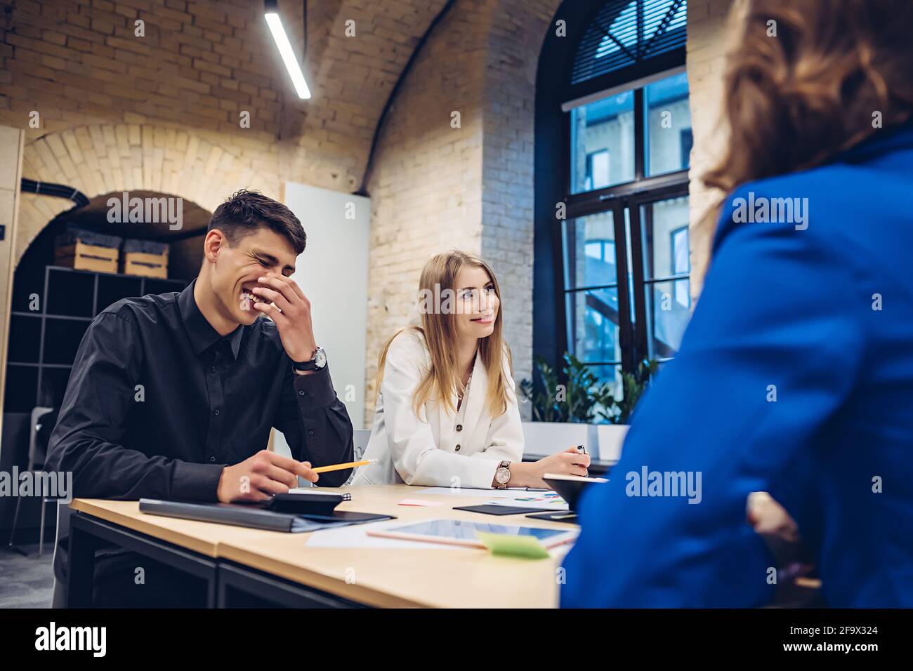 businesspeople discussing at table in office Stock Photo