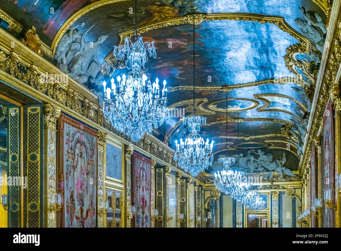STOCKHOLM, SWEDEN, AUGUST 18, 2016: View of a corridor with many chandeliers of the Kungliga slottet castle in Gamla Stan, Stockholm, Sweden Stock Photo