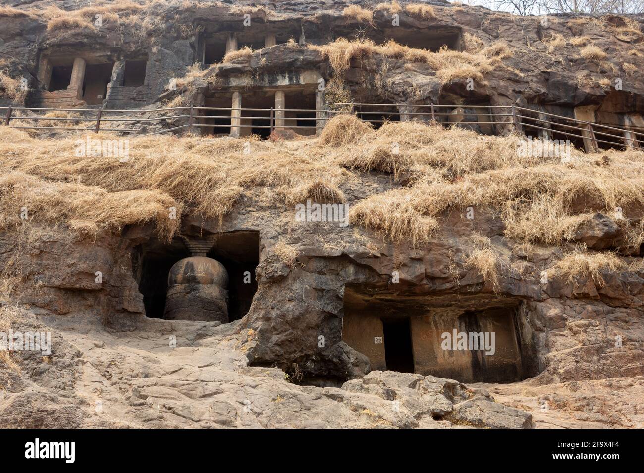 Outside view of Gandharpale Buddhist caves. Group of 30 Buddhist caves, 105 km south of Mumbai, near Mahad, Maharashtra, India Stock Photo
