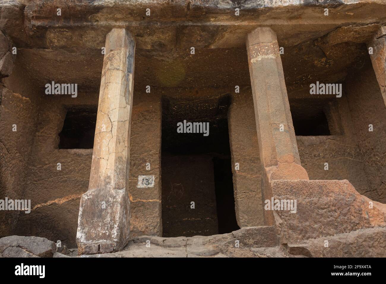 Façade of Cave No 13, Gandharpale Buddhist caves. Group of 30 Buddhist caves, 105 km south of Mumbai, near Mahad, Maharashtra, India Stock Photo