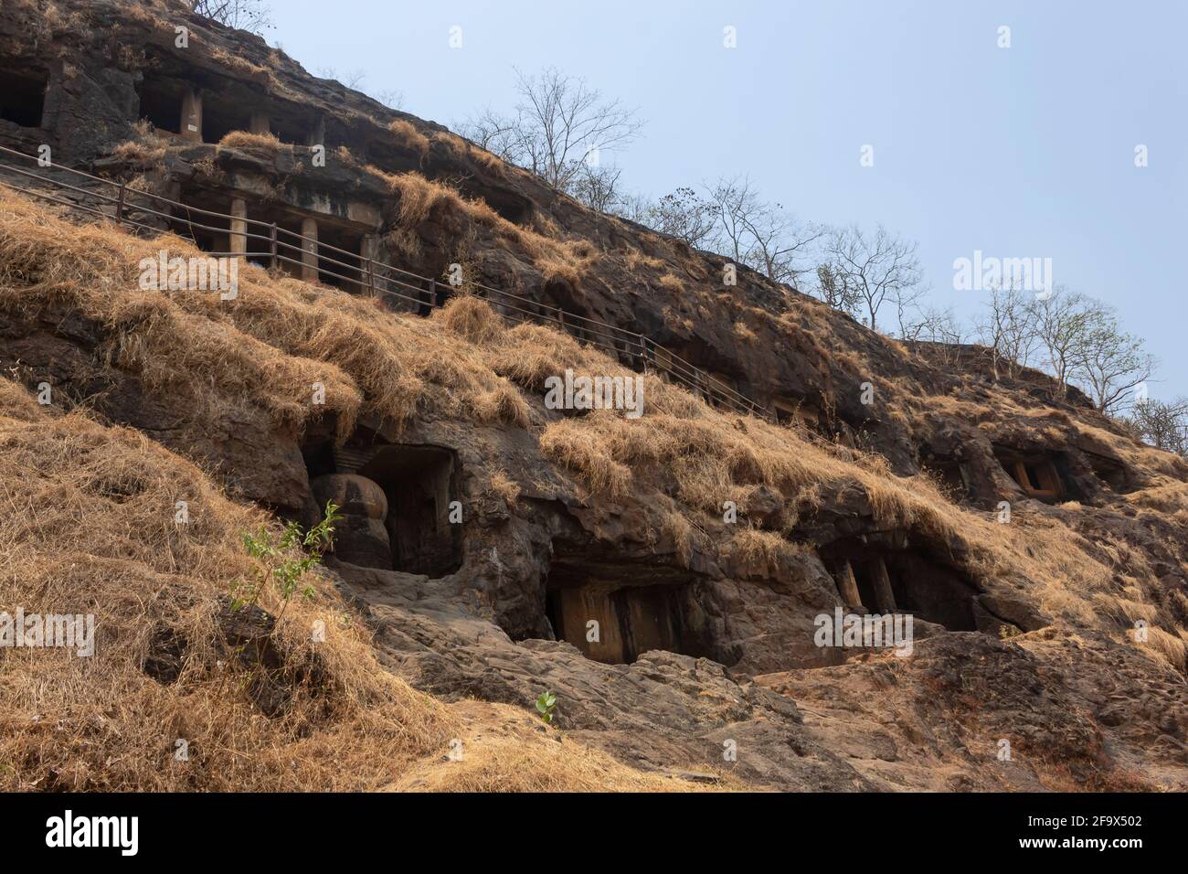 Outside view of Gandharpale Buddhist caves. Group of 30 Buddhist caves, 105 km south of Mumbai, near Mahad, Maharashtra, India Stock Photo
