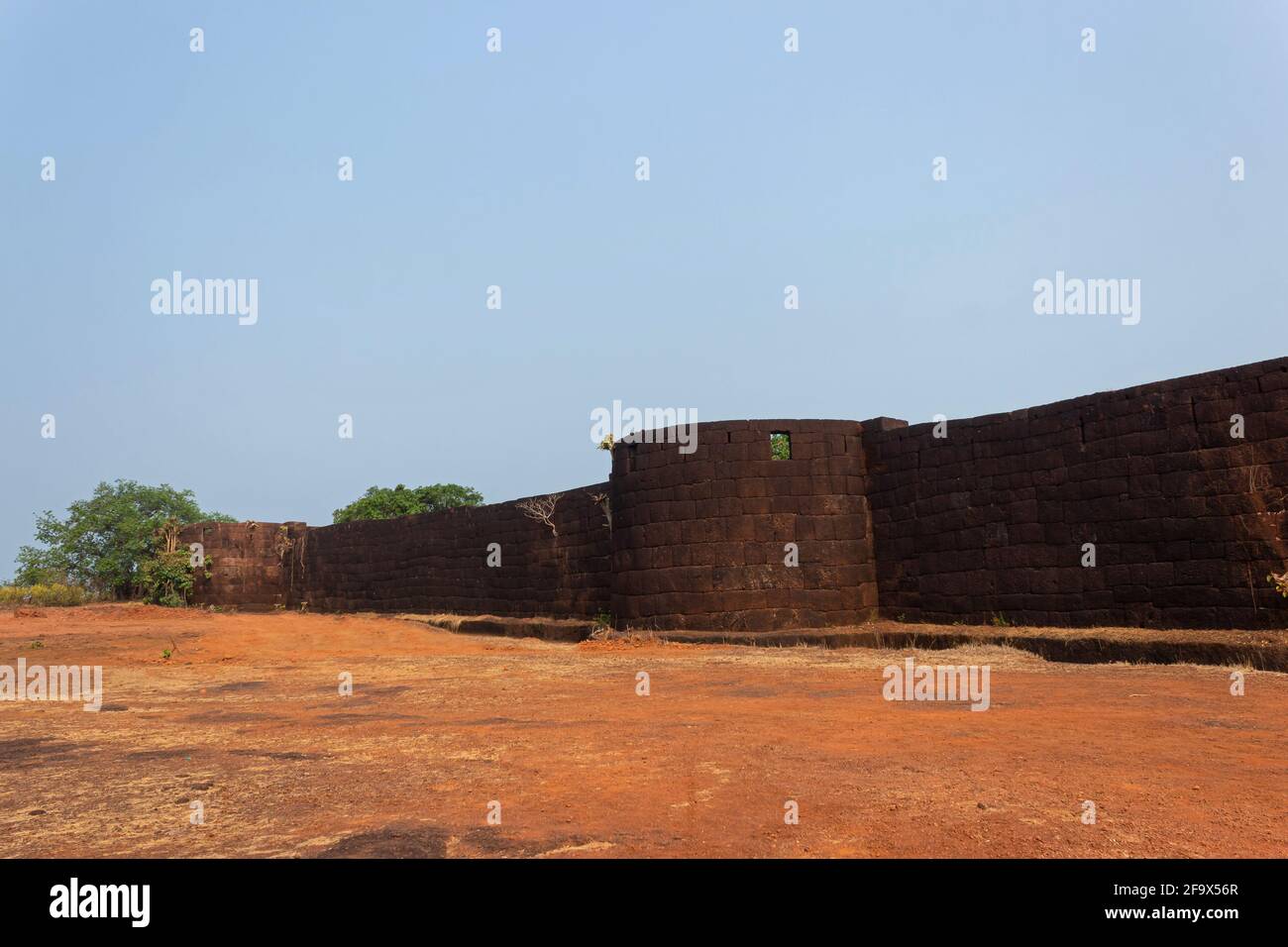 Bastions and outer walls of  Gopalgad Fort or Anjanvel Fort.  Captured by the King Shivaji from Mohammed Adil Shah in 1660 AD. Anjanwel, Maharashtra Stock Photo