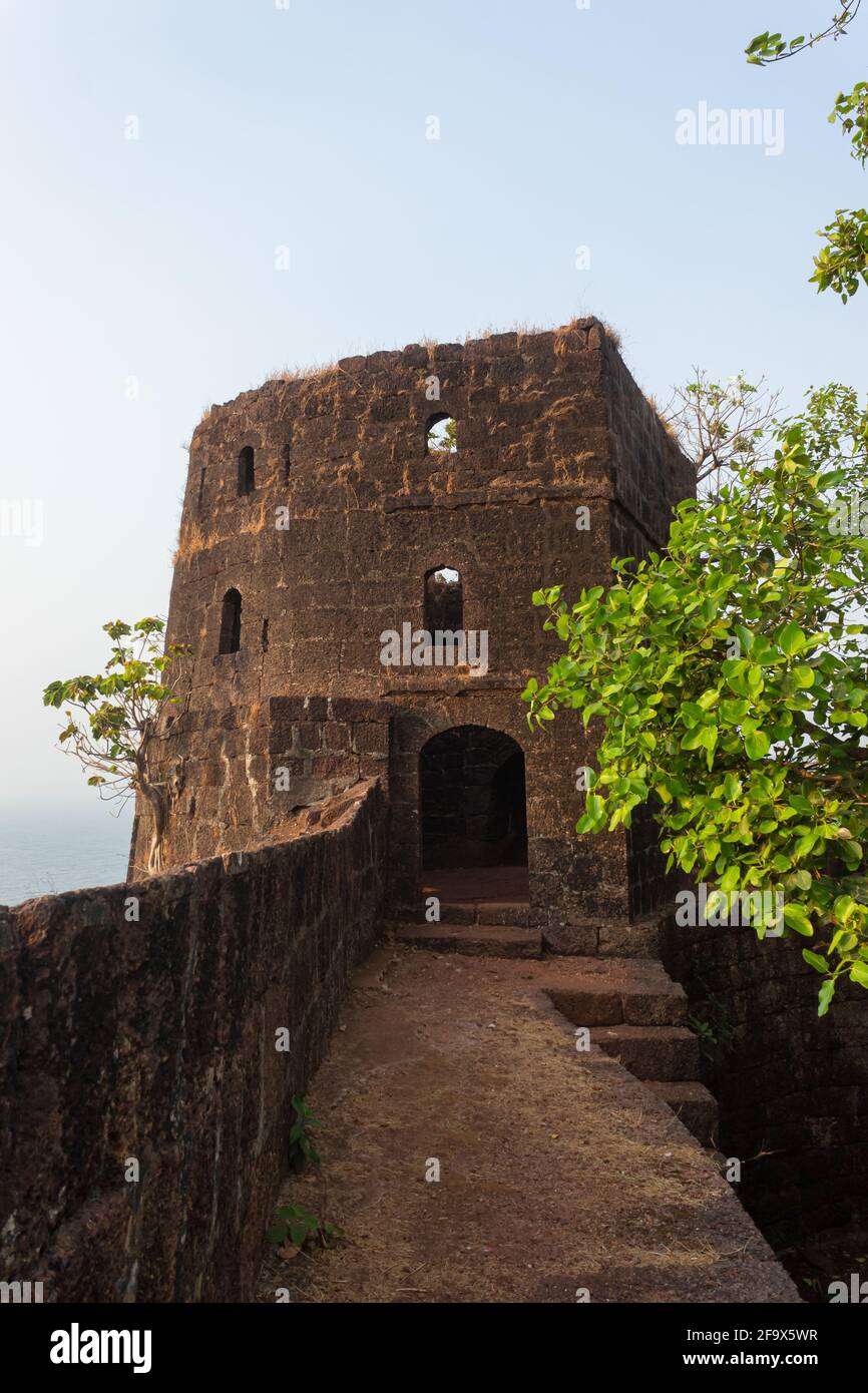 Sea side watch tower on the top of the fort, Jaigad, Maharashtra, India. Overlooks a bay formed where Shastri river enters the Arabian Sea Stock Photo