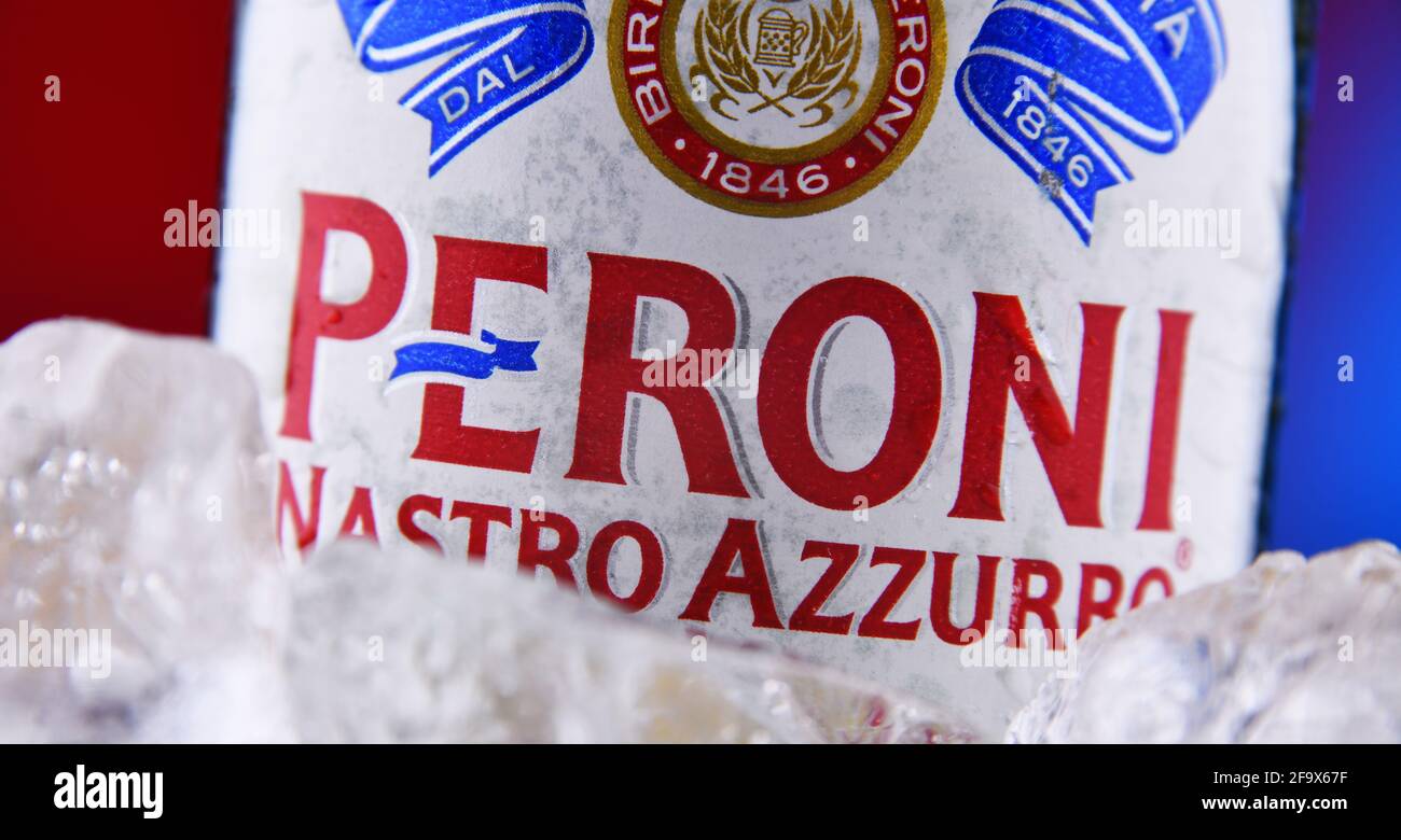 POZNAN, POL - FEB 18, 2021: Bottle of Peroni Nastro Azzurro, a premium lager produced since 1963 by Peroni Brewery located in Rome, Italy. Stock Photo