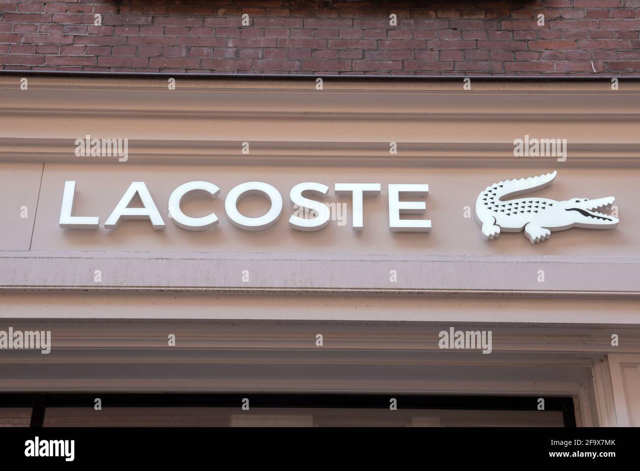 Billboard Lacoste Store At Amsterdam The Netherlands 25-3-2020 Stock ...