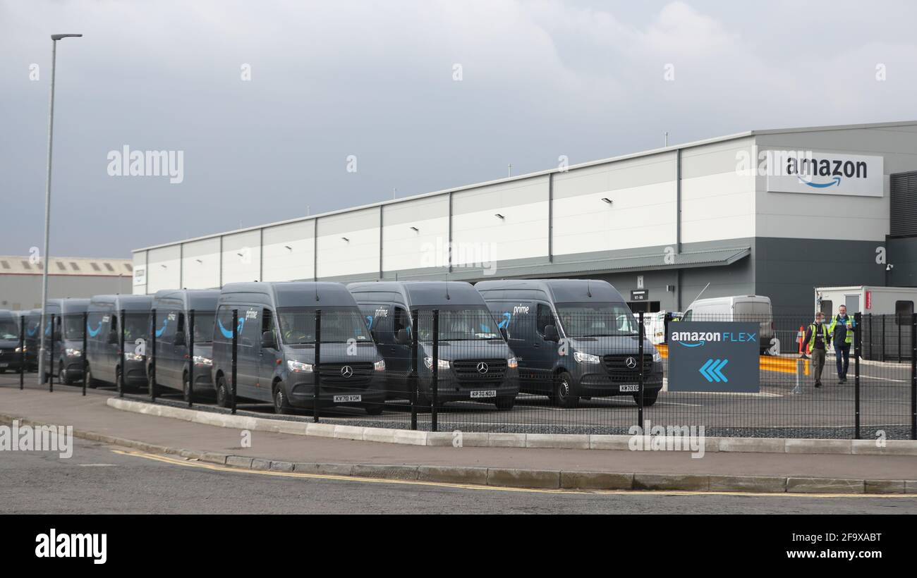 Electric delivery vans at the  warehouse in the Titanic Quarter,  Belfast. Picture date: Wednesday April 21, 2021. Photo credit should read:  Niall Carson/PA Wire Stock Photo - Alamy