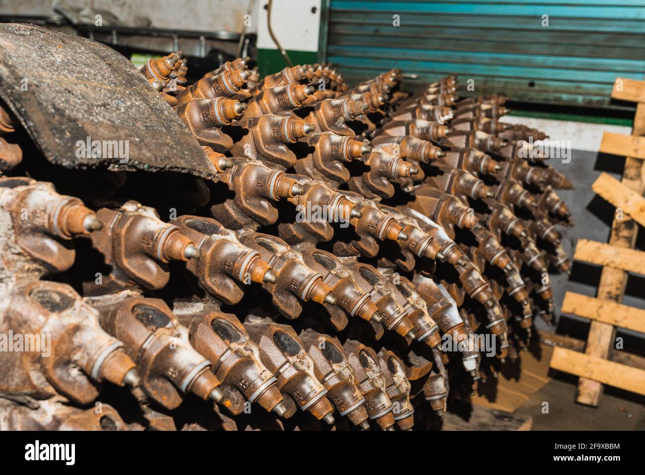 Closeup shot of heavy tools for lifting asphalt in a repair shop Stock Photo