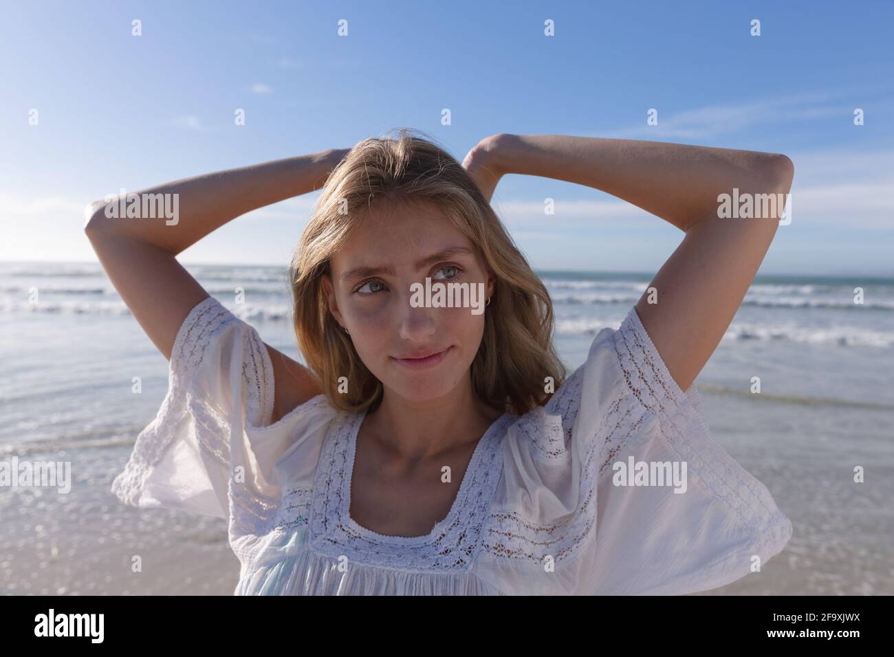 With her hands behind her head hires stock photography and images Alamy