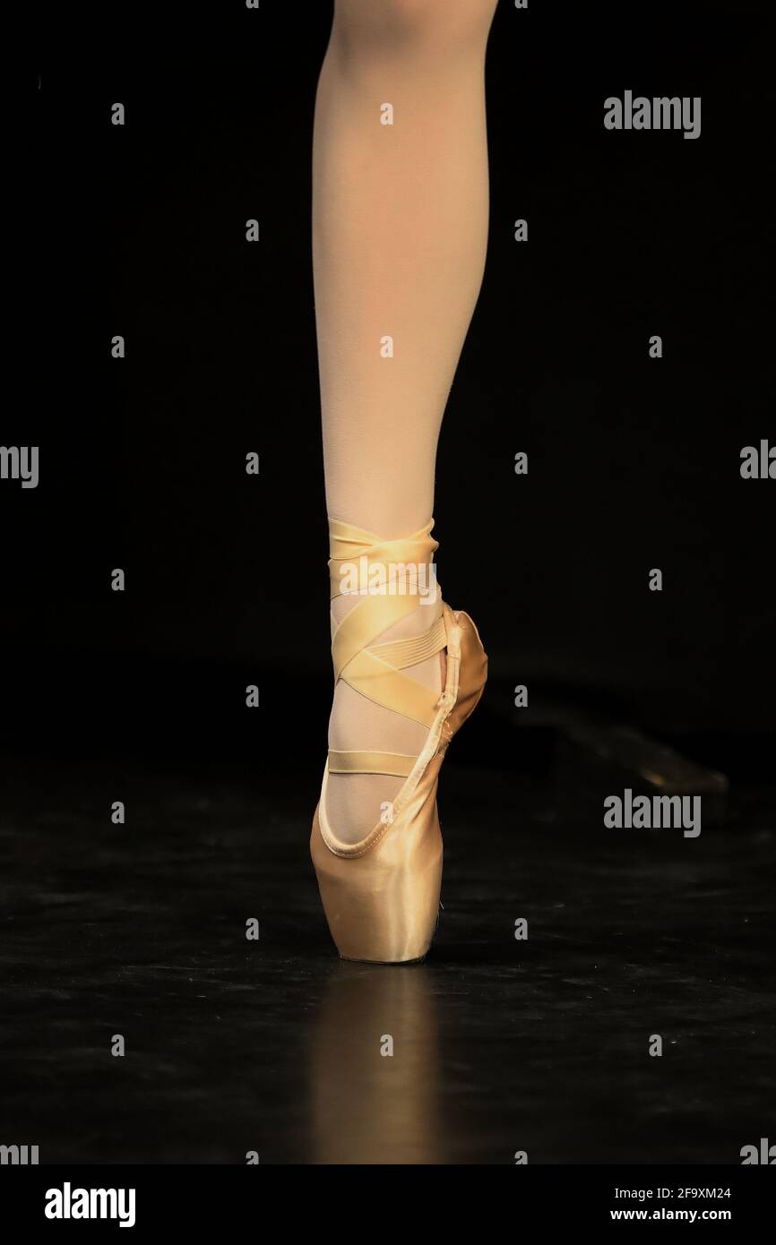 ballerina's foot in heels Stock Photo