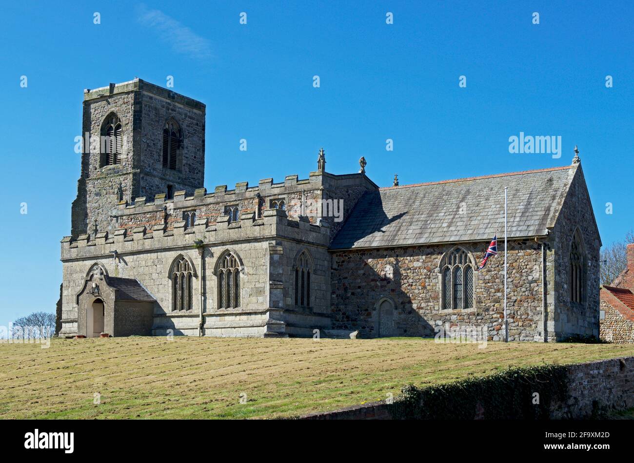All Saints Church in the village of Skipsea, East Yorkshire, England UK Stock Photo