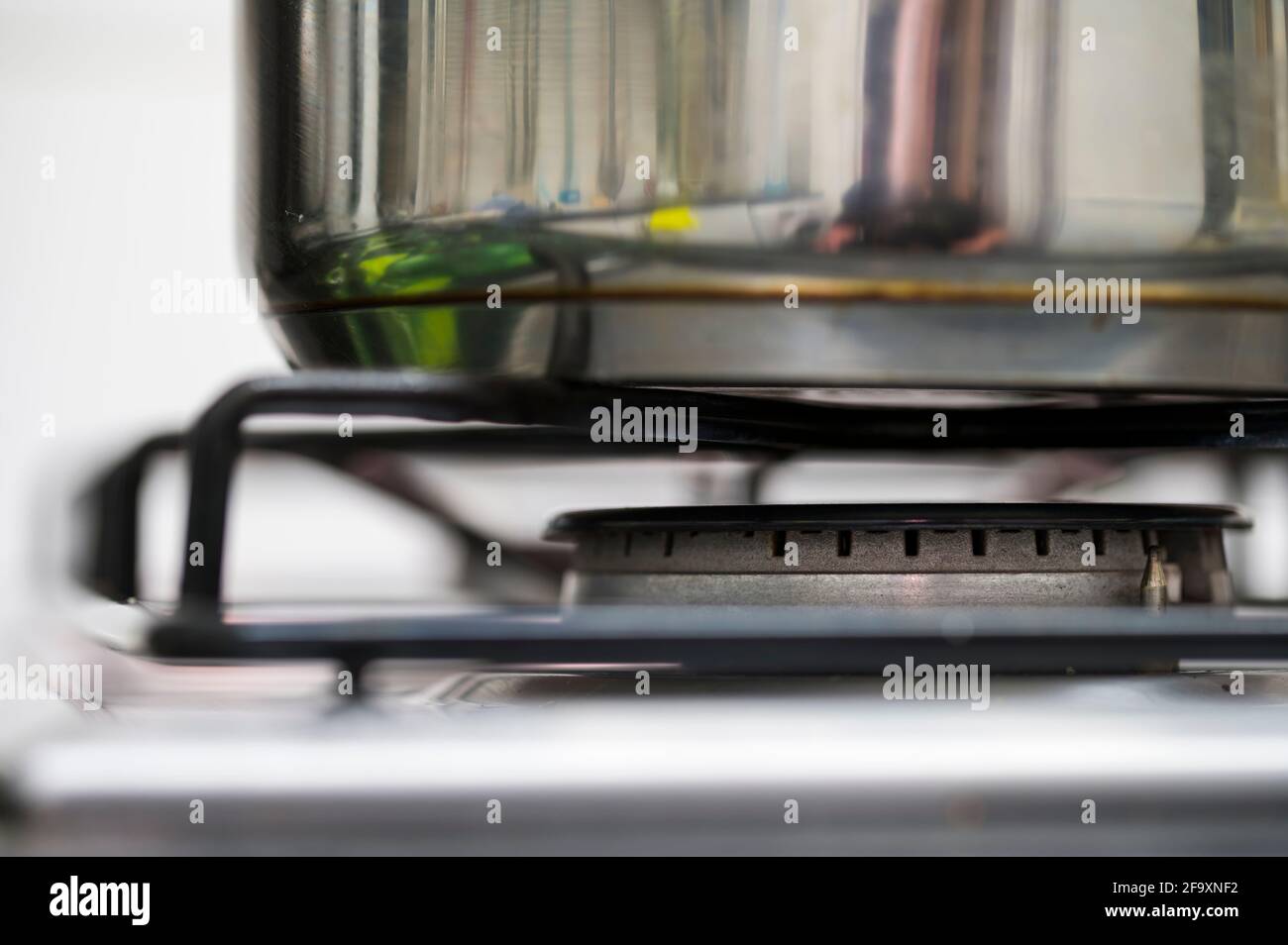A pot on a gas stove while cooking Stock Photo Alamy