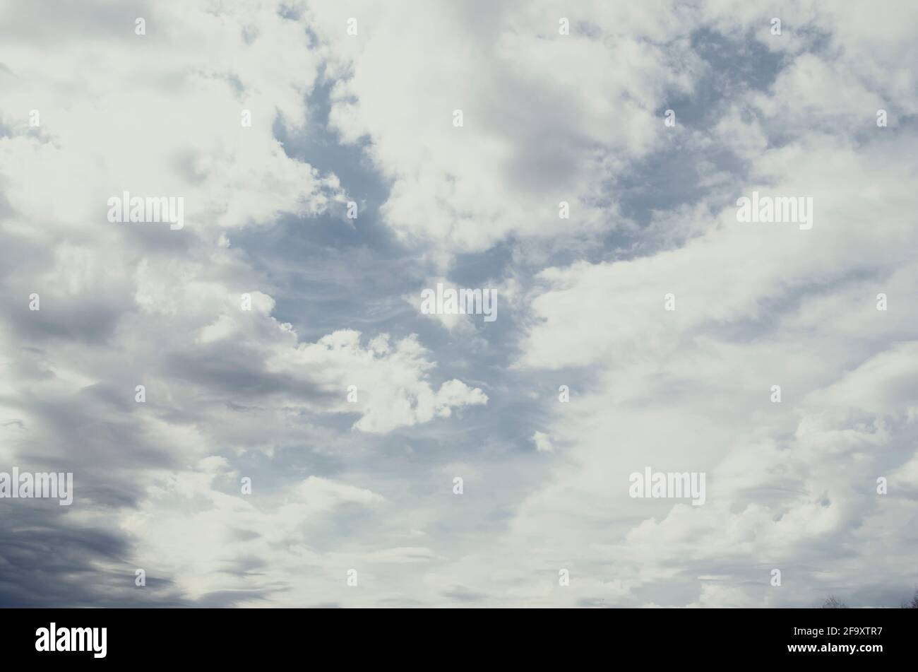 Cloudscape. Retro style picture. Cloudy sky. Stock Photo