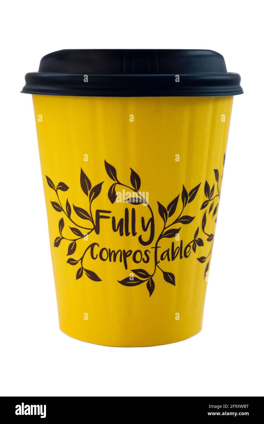 Fully completely compostable takeout / takeaway disposable single use paper coffee cup and lid isolated on transparent background. England UK Britain Stock Photo