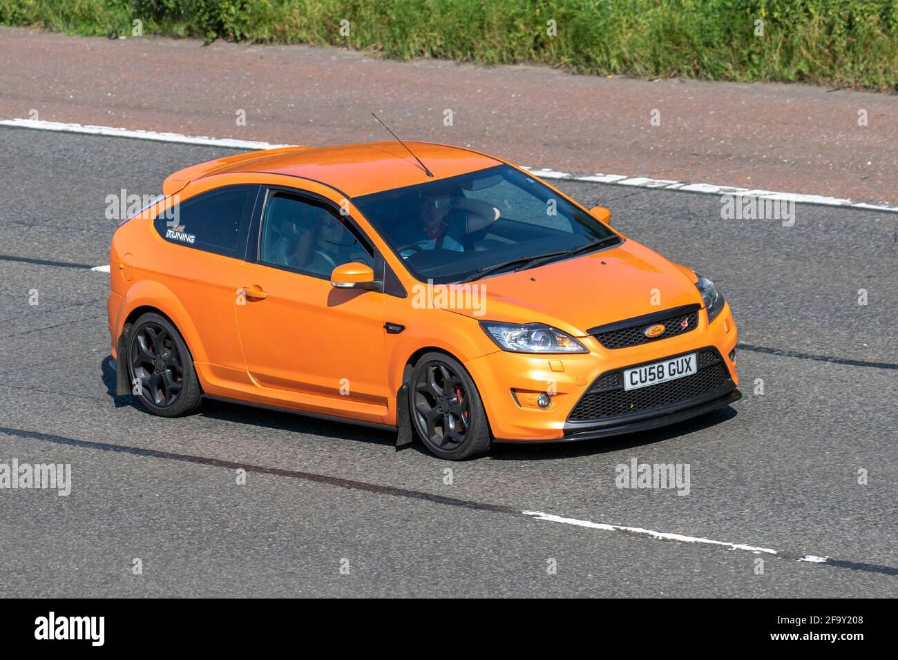 2008 Ford Focus 2.5 ST-2 5dr HATCHBACK Petrol Manual; moving vehicles,  cars, vehicle driving on UK roads, motors, motoring on the M6 English  motorway road network Stock Photo - Alamy