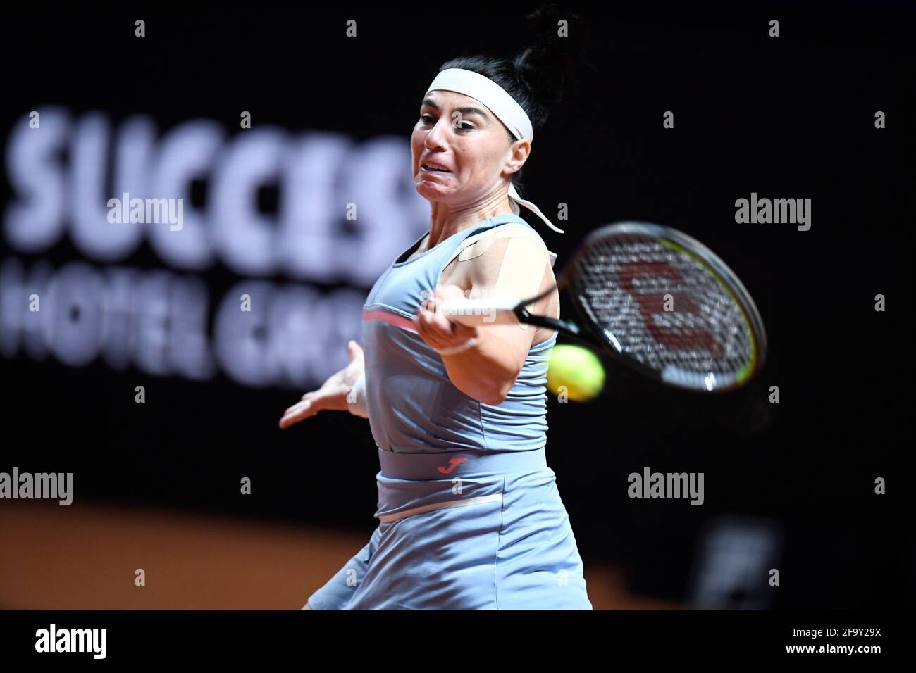 Stuttgart, Germany. 21st Apr, 2021. Tennis: WTA Tour - Stuttgart, Singles, Women, 1st round in Porsche Arena. A. Kerber (Germany) - E. Gorgodze (Georgia): Ekaterine Gorgodze in action. Credit: Thomas Kienzle/AFP-Pool/dpa/Alamy Live News Stock Photo