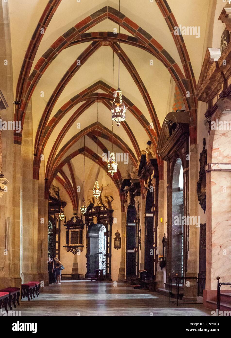 Gniezno, Poland - July 1, 2015: Gothic aisle of Gniezno Cathedral with sarcophagus and coffin of St. Adalbert, Sw. Wojciech, martyr in old town Stock Photo