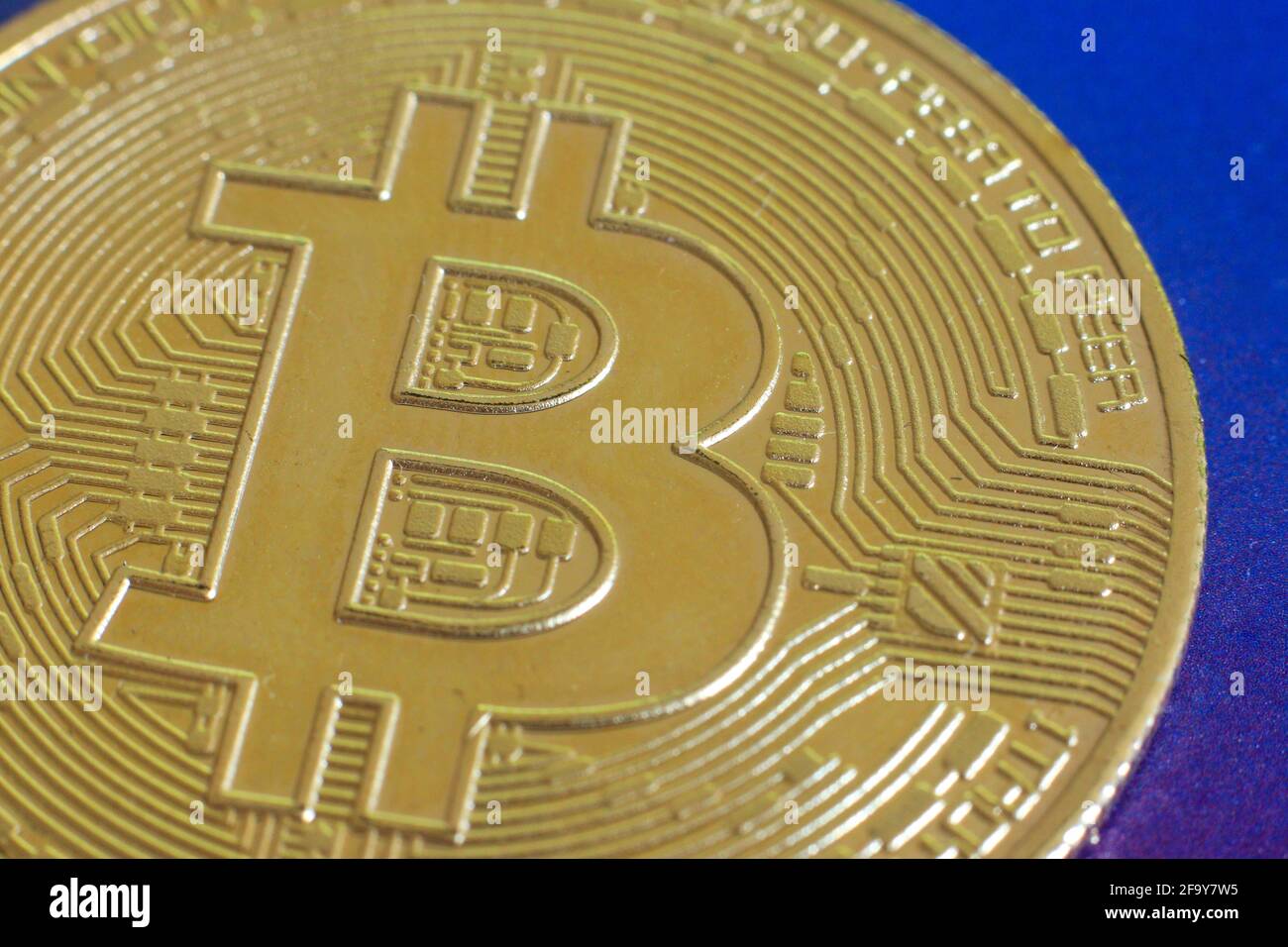 Close up of a physical version of Bitcoin BTC .Stock Market Concept. BTC Stock Photo