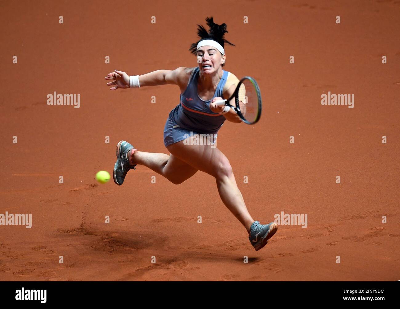 Stuttgart, Germany. 21st Apr, 2021. Tennis: WTA Tour - Stuttgart, Singles, Women, 1st round in Porsche Arena. A. Kerber (Germany) - E. Gorgodze (Georgia): Ekaterine Gorgodze in action. She lost after two sets 6:2 and 6:2. Credit: Thomas Kienzle/AFP-Pool/dpa/Alamy Live News Stock Photo