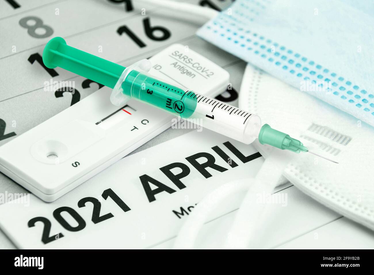 Corona concept Vaccination, Rapid Test and masks April 2021 Stock Photo