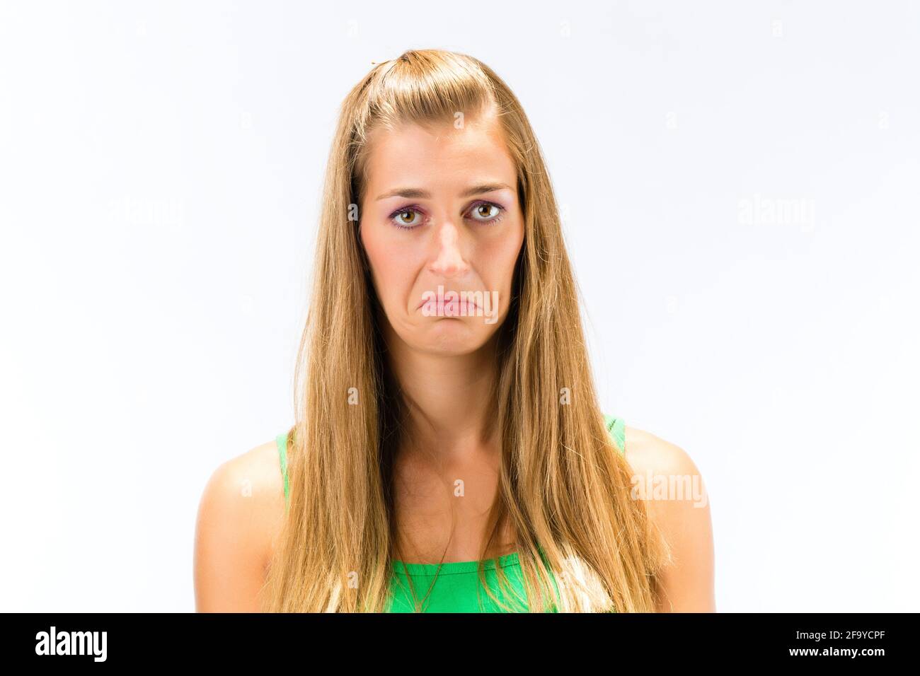 Sad blonde woman on white background hi-res stock photography and ...