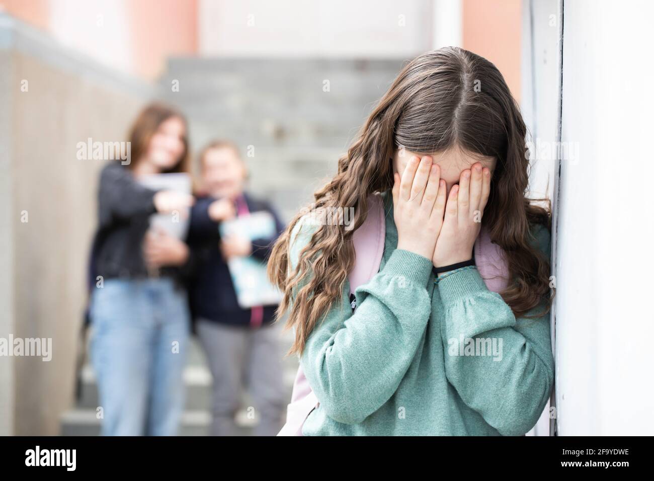 Girl being bullied at the school. Educational school isolation and