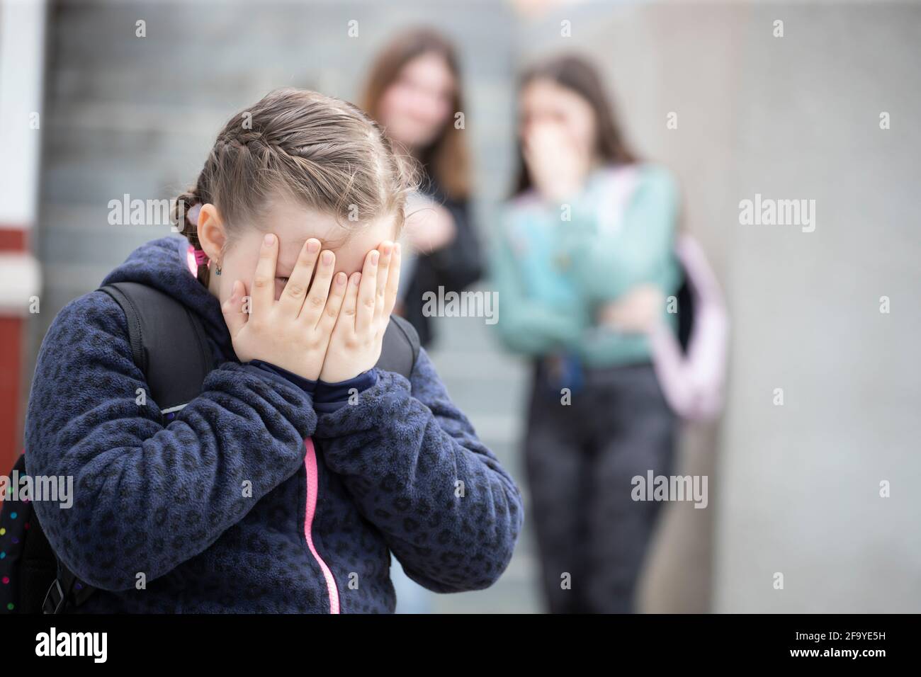 Girl being bullied at the school. Educational school isolation and