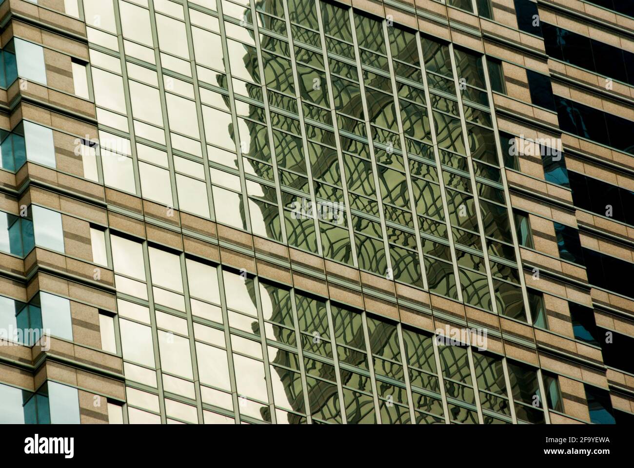 Reflections of one tall building in the mirrored windows of another- Philadelphia USA. Stock Photo