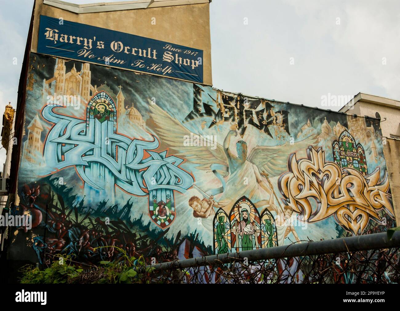 A public artwork / mural painted on the side of Harry's Occult Shop in South Street, Philadelphia. The store has been demolished since this 2009 image. Stock Photo