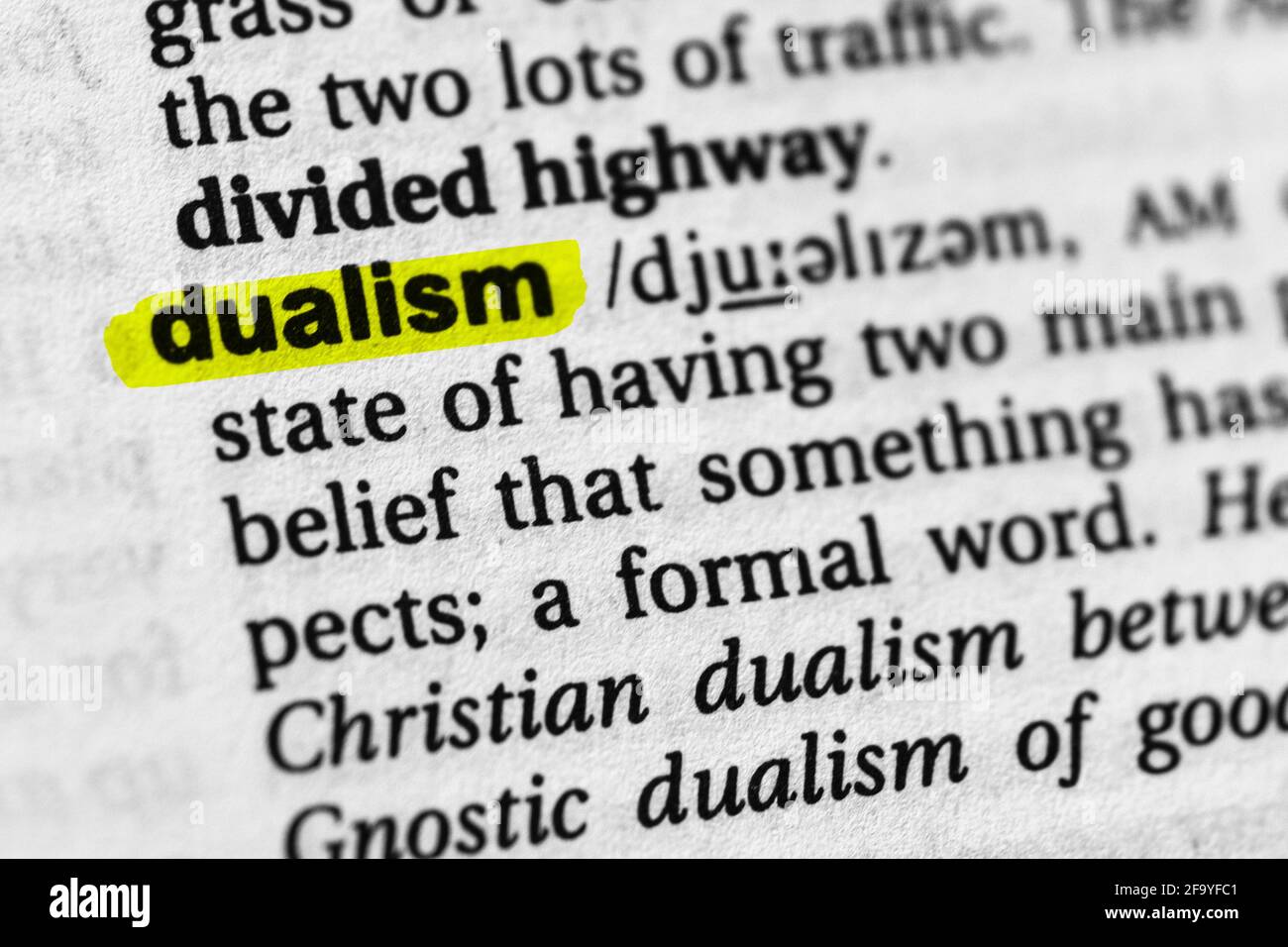 Highlighted word dualism concept and meaning Stock Photo