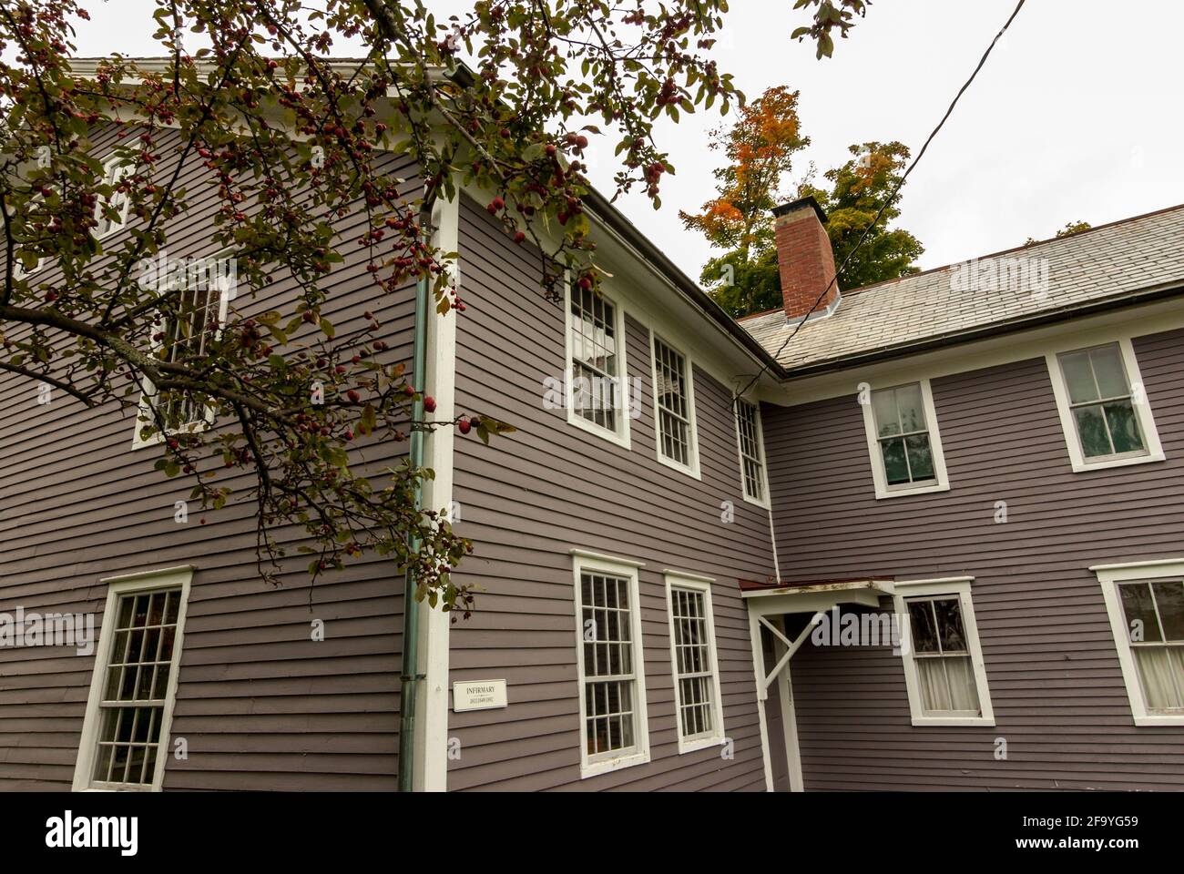 A purple / grey clapperboard house in the Canterbury Shaker Village, New Hampshire, USA. Stock Photo