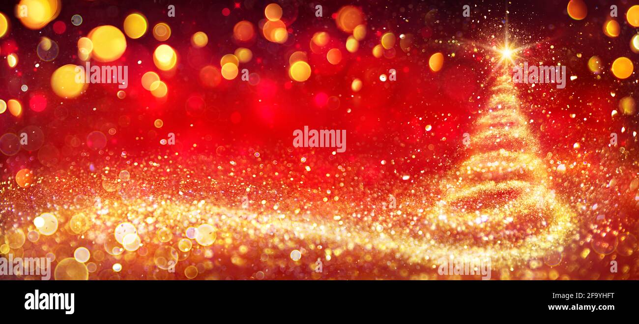 Golden Christmas Tree In Red Festive Background Stock Photo - Alamy