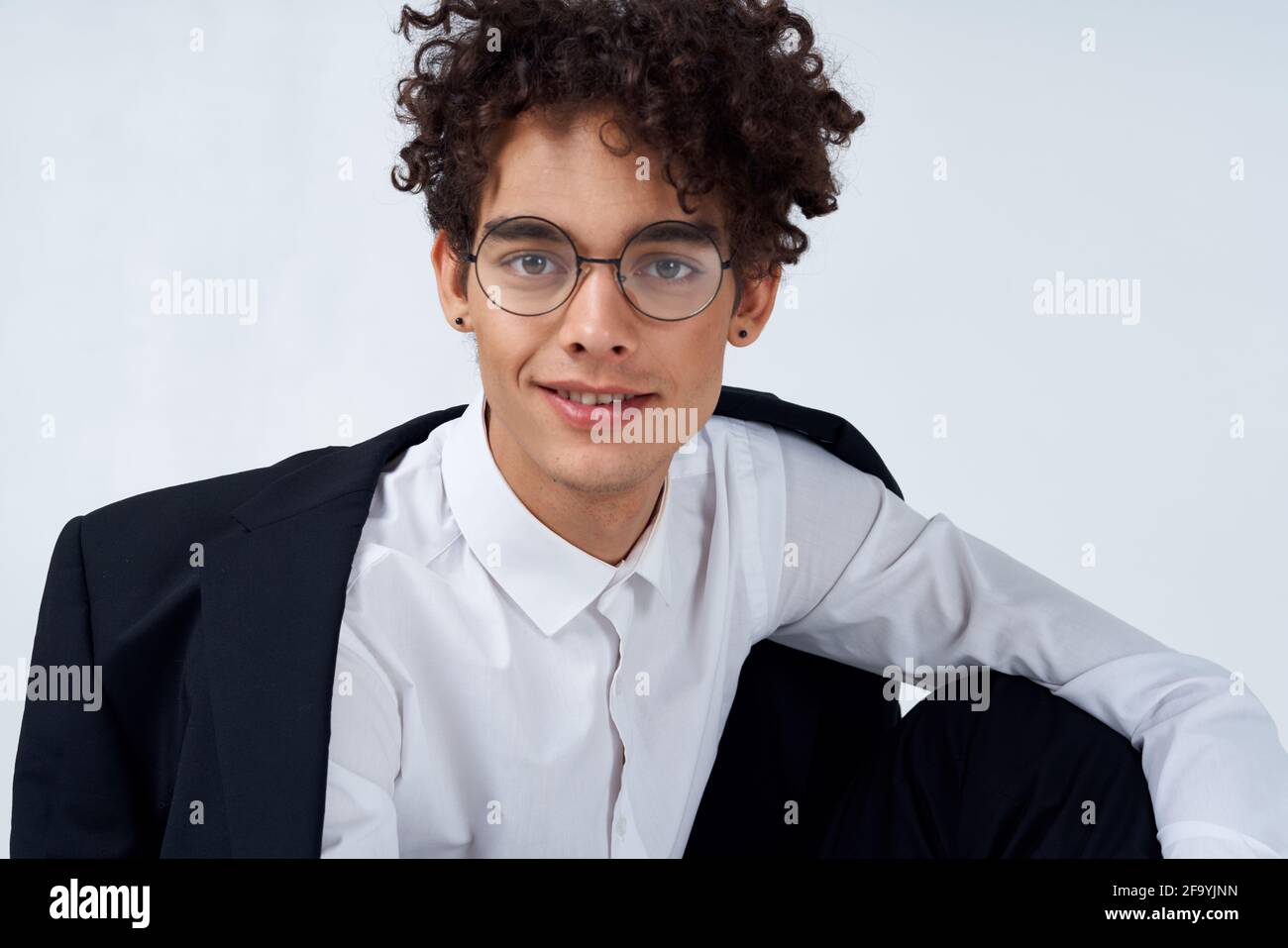 guy curly hair glasses and jacket photography studio model light ...