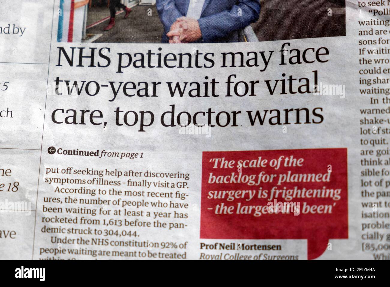 'NHS patients may face two-year wait for vital care, top doctor warns' Covid newspaper headline article in The Guardian 3 April 2021 London England UK Stock Photo