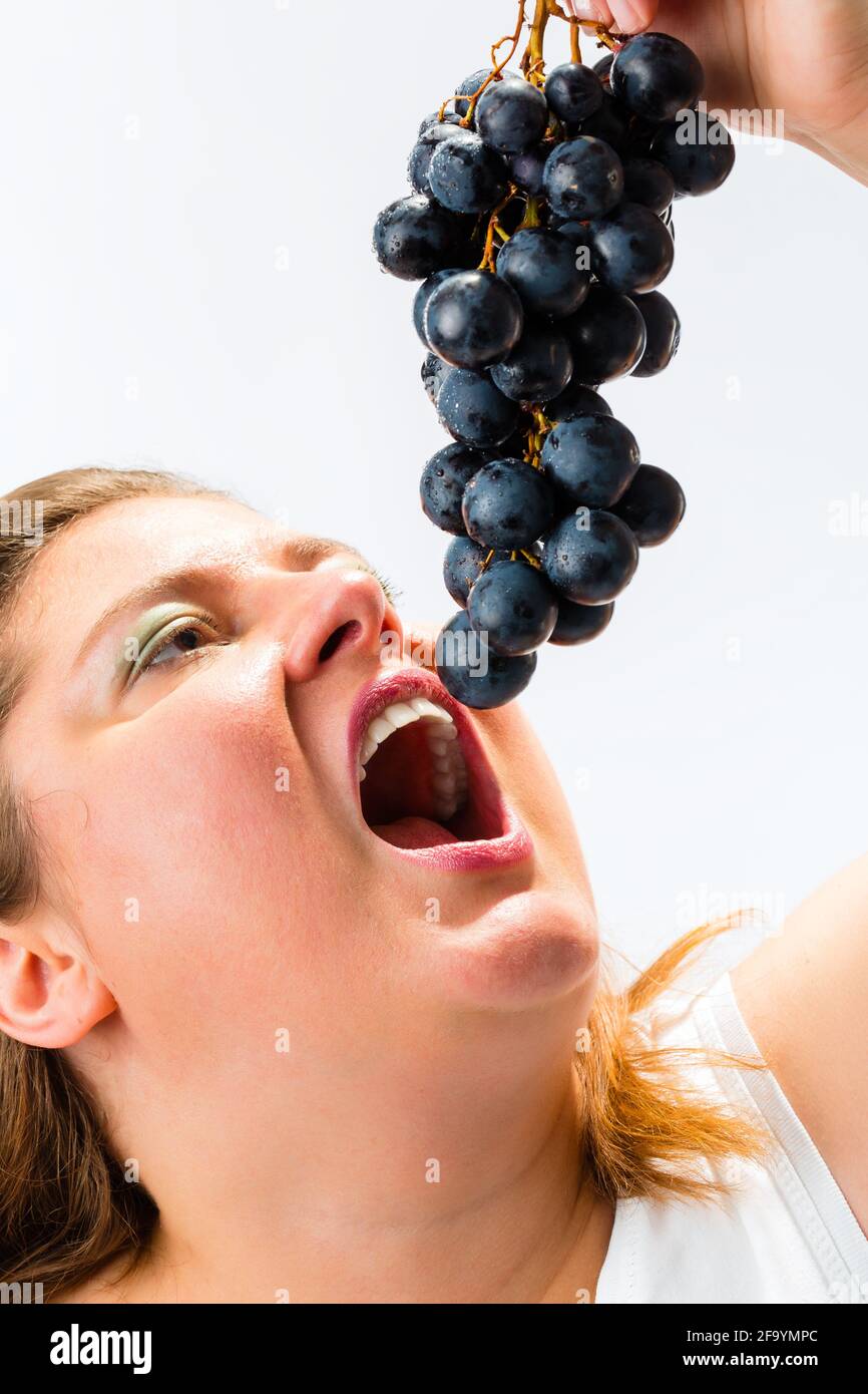 Fat Guy Eating Grapes