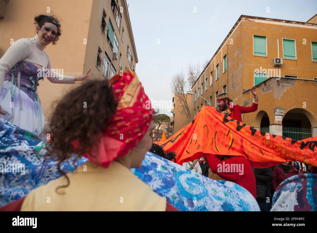 Every year in Rome, at the Garbatella district, during the event called Carnevale Liberato artists and jugglers perform in the streets. Rome 02 13 201 Stock Photo