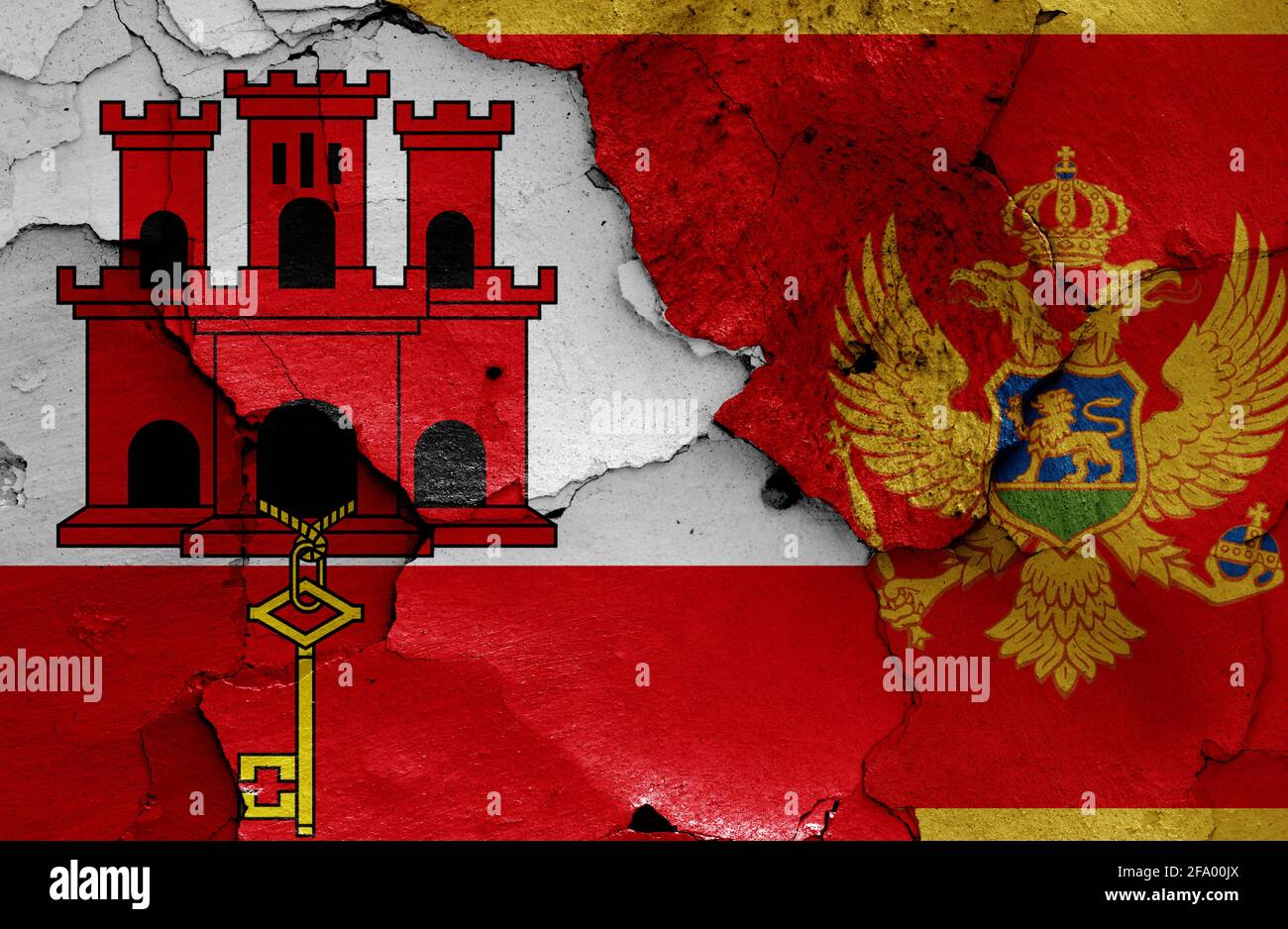 flags of Gibraltar and Montenegro painted on cracked wall Stock Photo ...