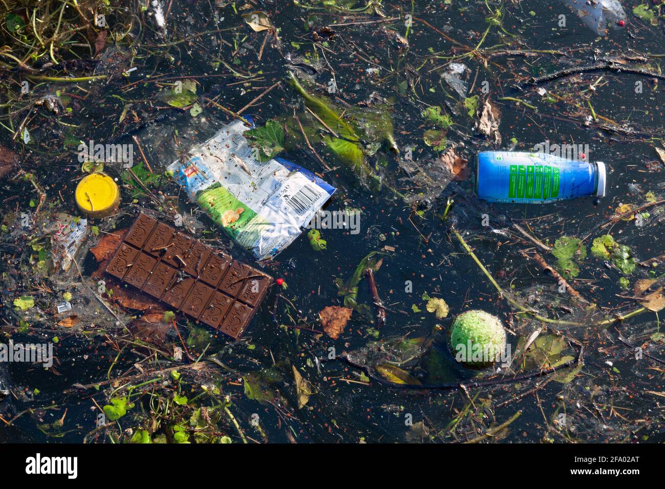 UK, England, London, Southall, Litter and Rubbish in the water from The Grand Union Canal Walk Stock Photo