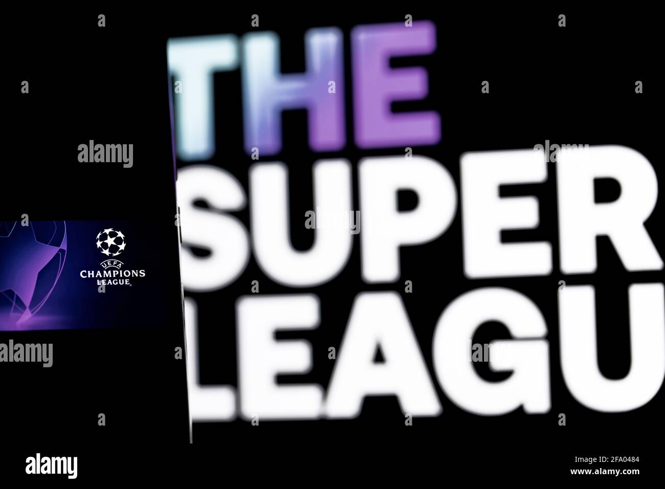 Editorial selective focus photo on The Super League versus UEFA Champions League theme.  Illustrative photo for news about The Super League and UEFA C Stock Photo