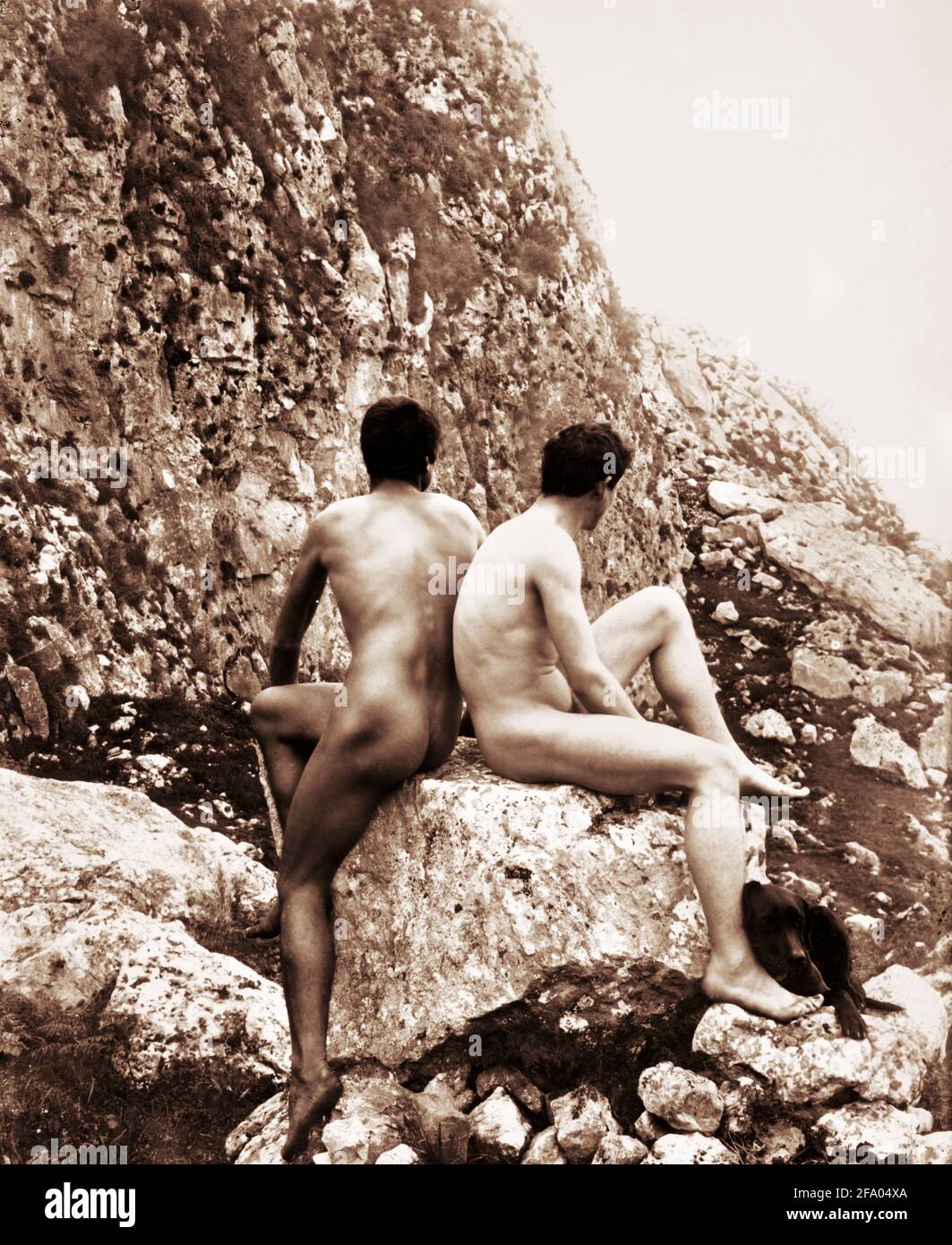 Wilhelm von Gloeden, Two Male Nudes on Rock. Nude photograph of two Sicialian boys by the German photographer, Wilhelm Iwan Friederich August Freiherr von Gloeden (1856-1931) Stock Photo
