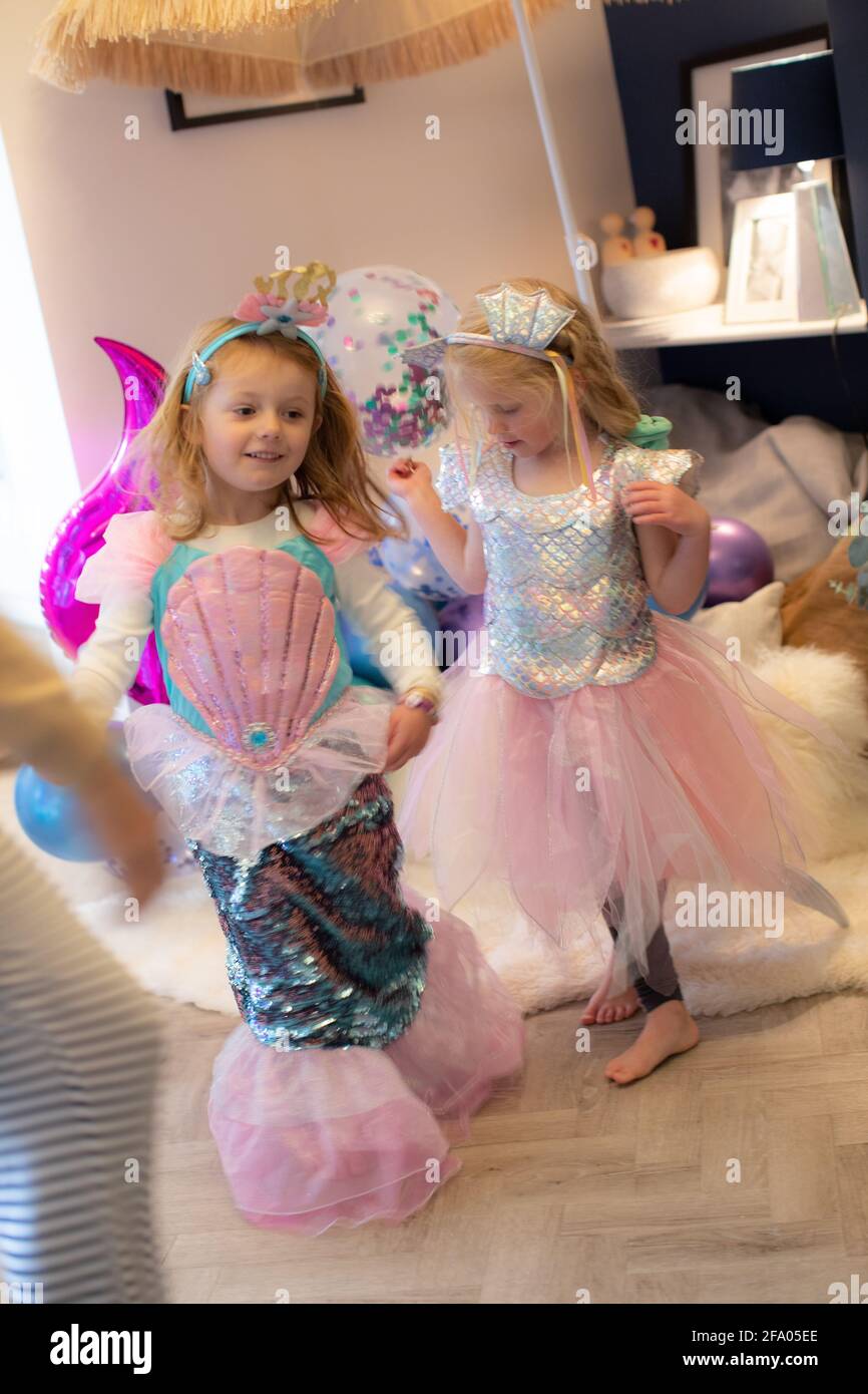 Little girls playing dress up hi res stock photography and images