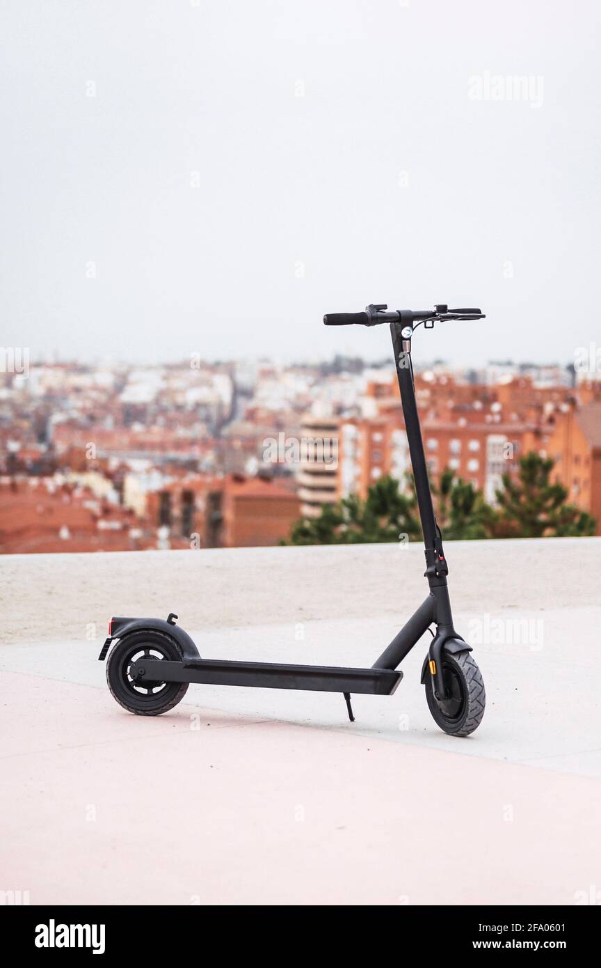 Electric scooters on the sidewalk Stock Photo Alamy