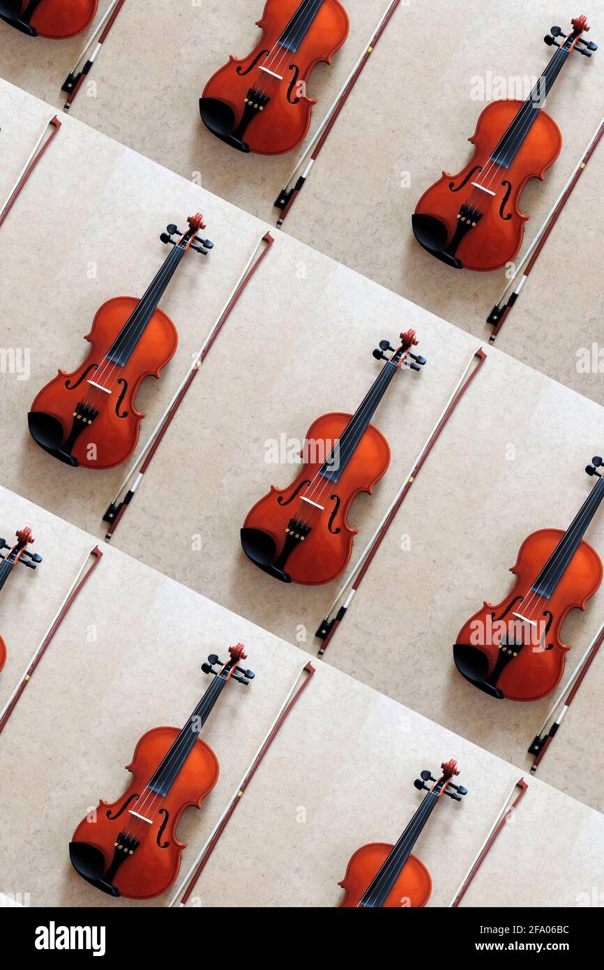 Violin pattern on grey background. Minimalistic concept music instrument Stock Photo
