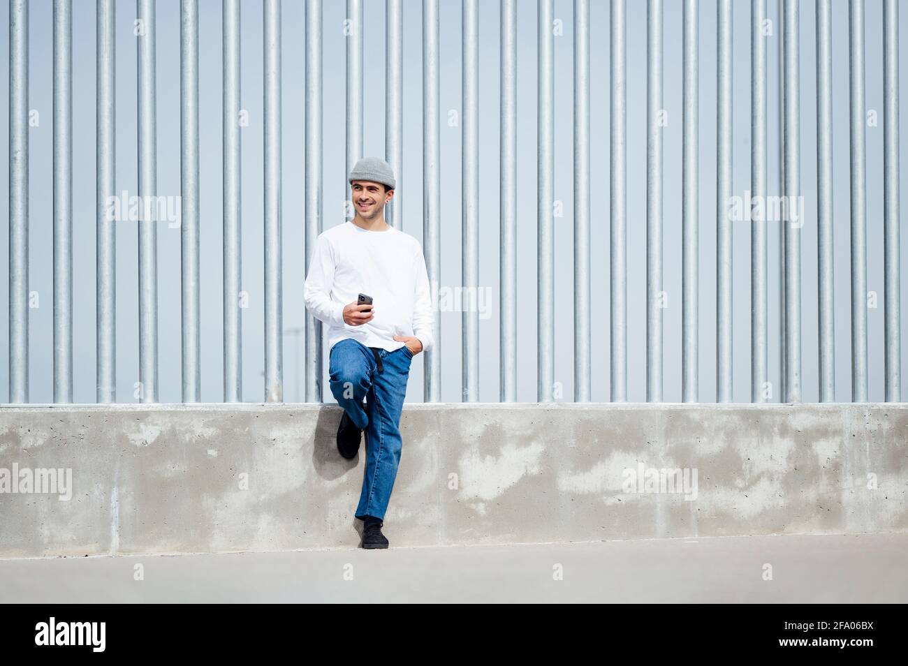 Man leaning on hand hi-res stock photography and images - Alamy