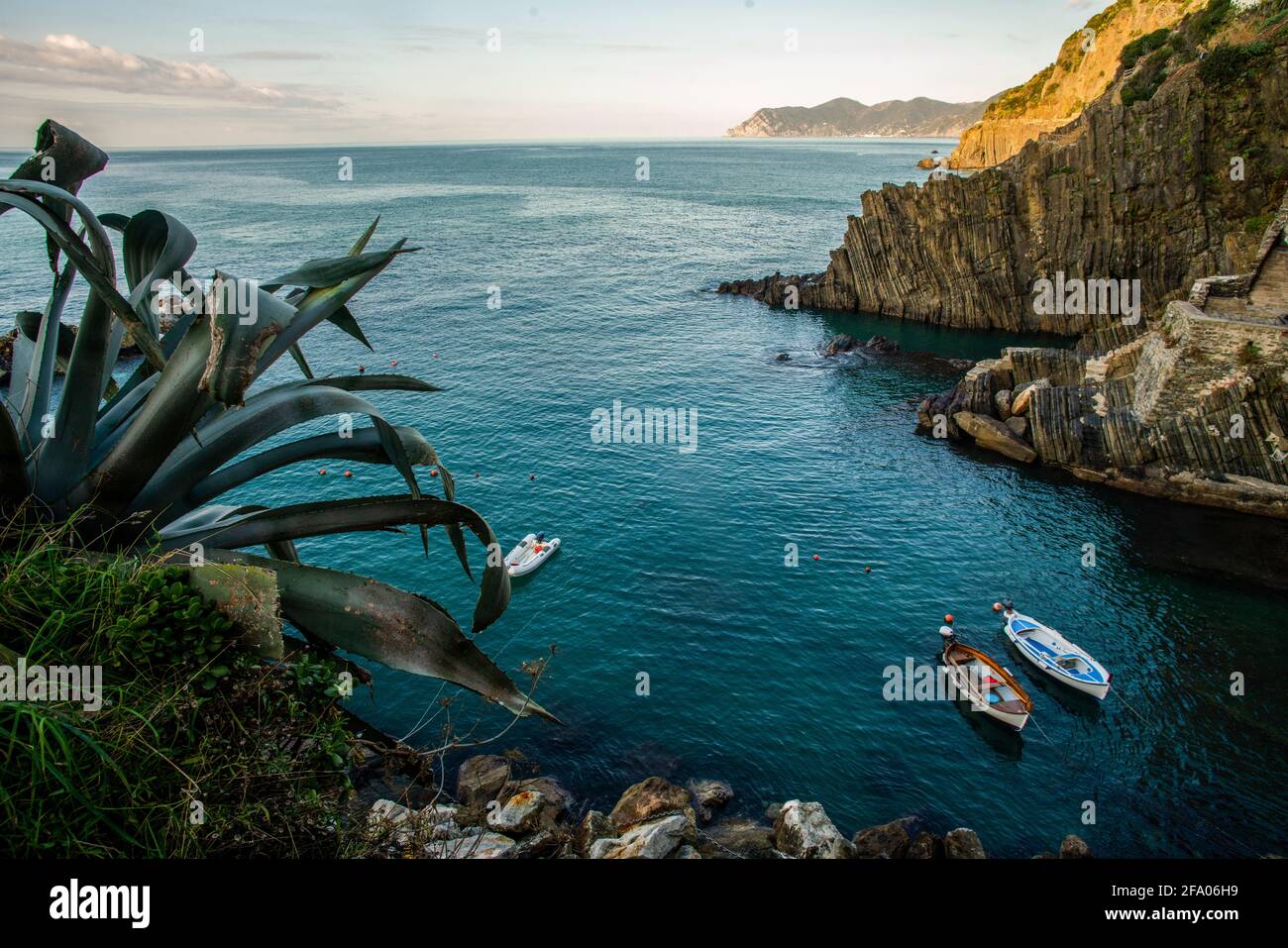 Idyllic view on bay of Riomaggiore -Ligurian coast with fantastic rocks   and Cinque Terre - UNESCO  World Heritage of Humanity Stock Photo
