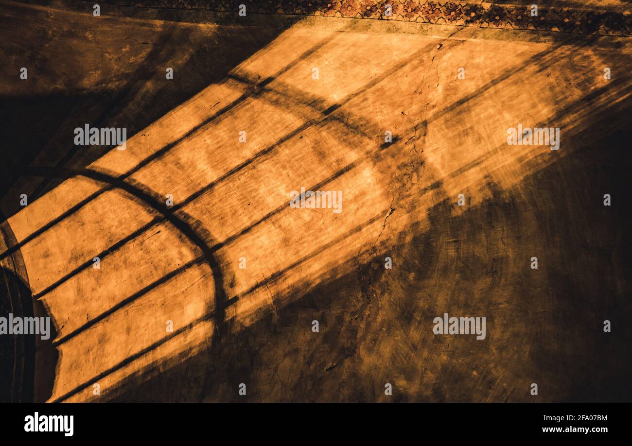 shadows from the lattice in a mysterious arch Stock Photo